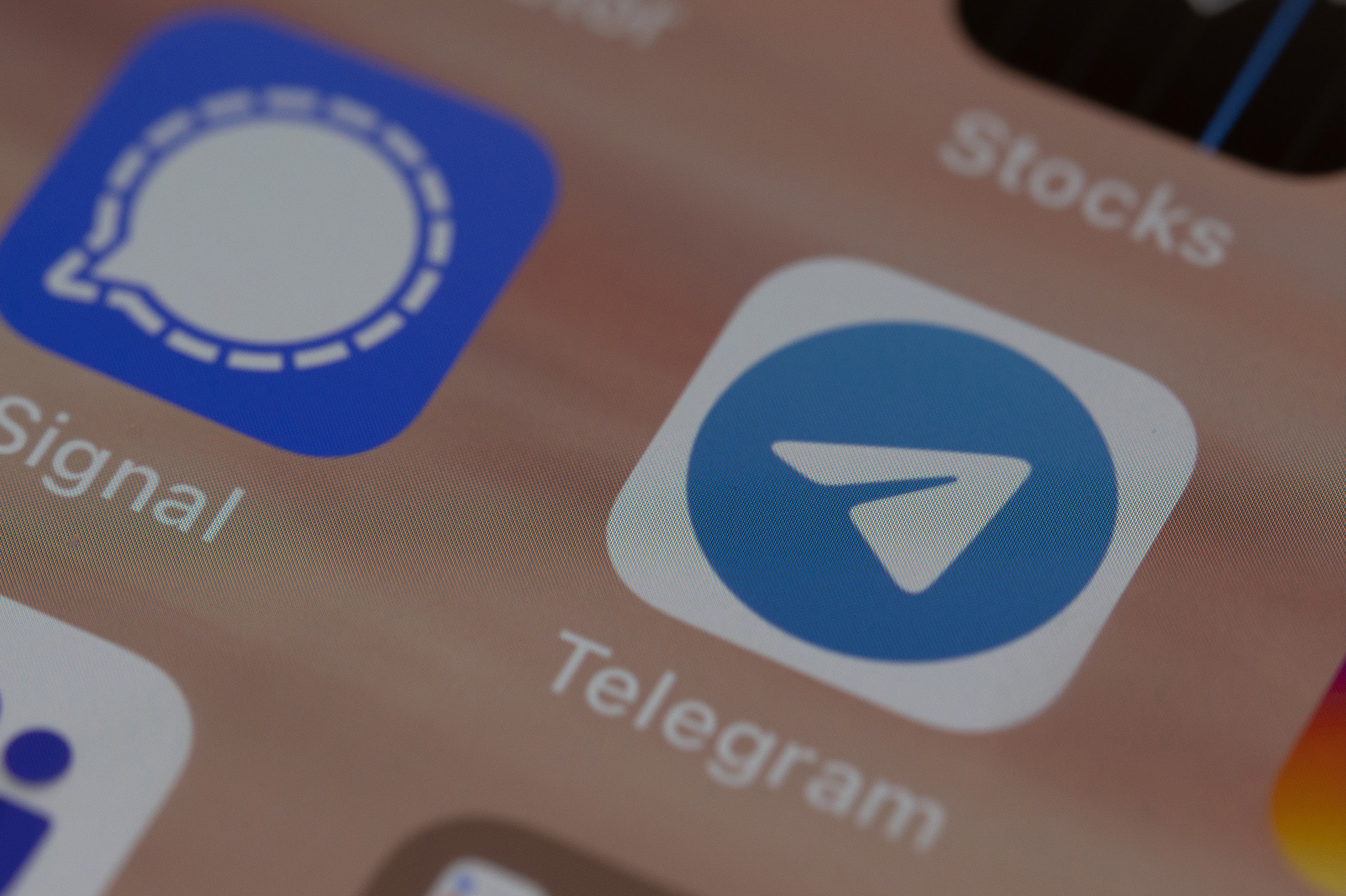 Telegram app logo on a phone